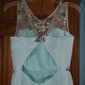 Teal embroidered sleeveless formal dress